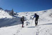 Dog comes too on a snowshoe adventure holiday