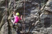 Kids problem solving while rock climbing