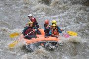 Running the rapids river rafting in the Pyrenees