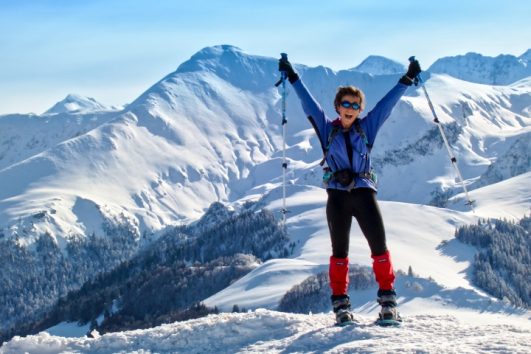 Reaching the peak on a snowshoe holiday