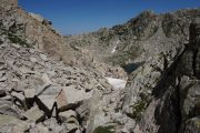 Boulder strewn paths and lake