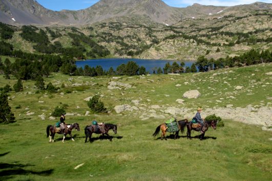 Horse riding holiday past Pyrenees lakes