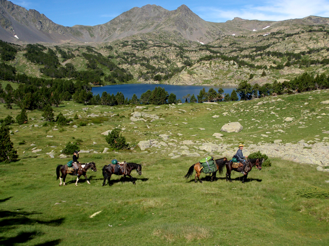 Horse riding holiday past Pyrenees lakes
