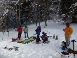 Enjoying a chocolate fondue on a family snowshoe adventure