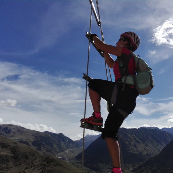 Challenging via ferrata on a family adventure holiday with teens