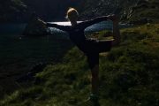Yoga by a mountain lake