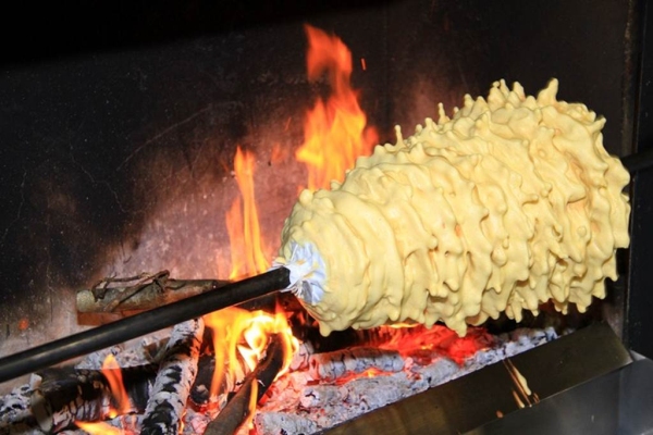 Making traditional tree cake in the Pyrenees