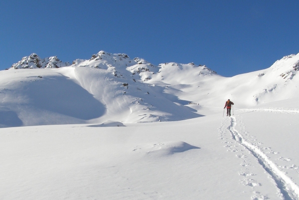 Heading into the mountains on a back-country ski tour