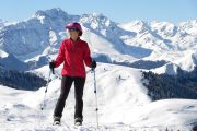 lady snowshoeing in the Pyrenees mountains